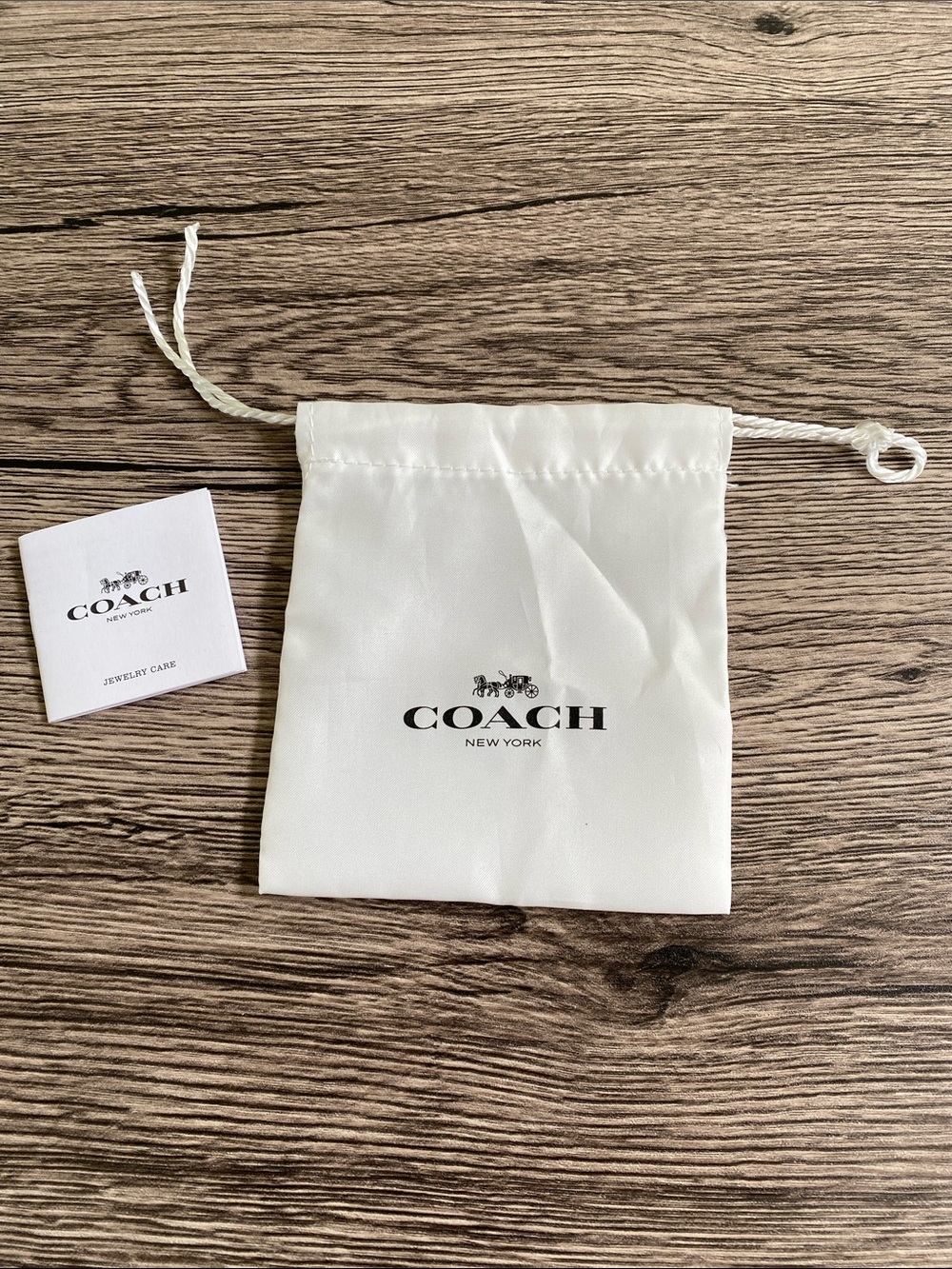 Coach White Satin Drawstring Jewelry Pouch with Logo and Care Booklet